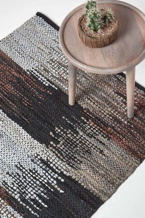 Homescapes Real Leather Handwoven Cutshuttle Rug