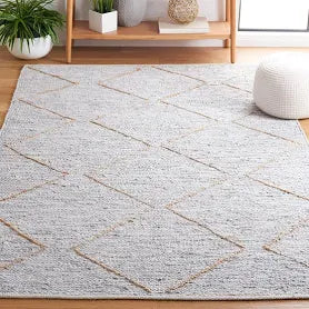 SAFAVIEH Suseela Modern Handmade Area Rug