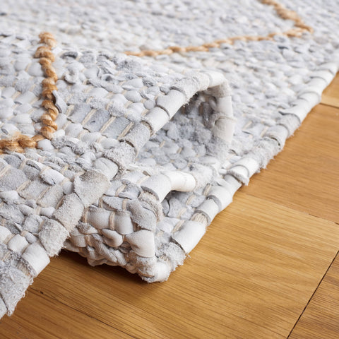 SAFAVIEH Suseela Modern Handmade Area Rug