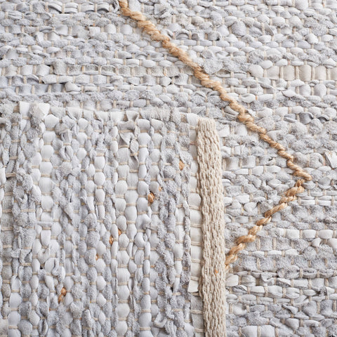 SAFAVIEH Suseela Modern Handmade Area Rug
