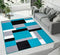 Tarra Tufted Teal/Black/White Area Rug Ebern Designs Rug