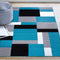 Tarra Tufted Teal/Black/White Area Rug Ebern Designs Rug