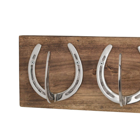 Four Nickel Horse Shoe Hooks On Wooden Board Accessories Hill Interiors 